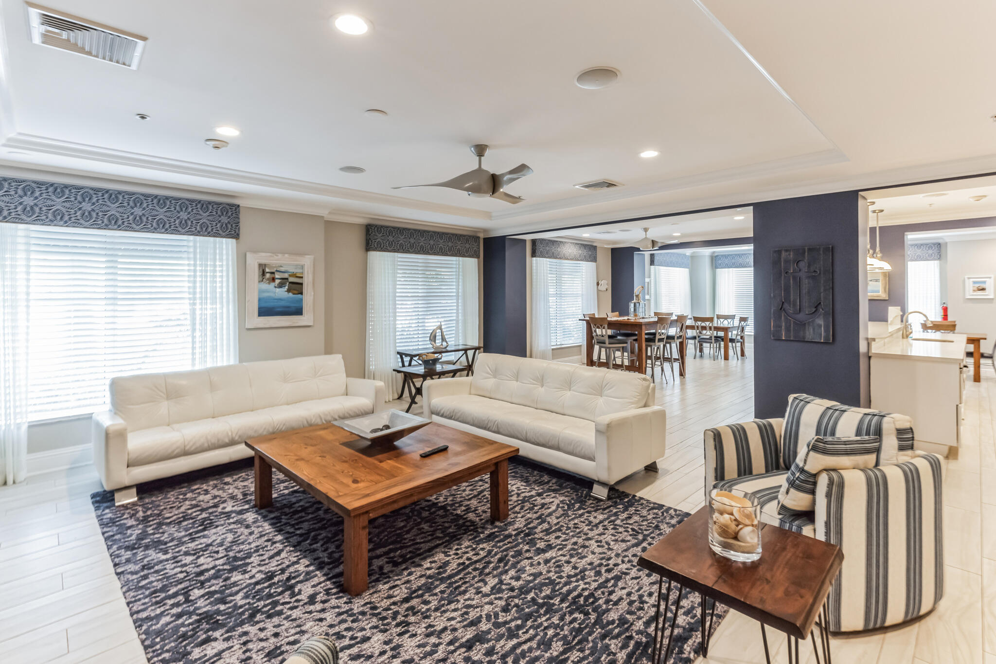 700 East Boynton Beach Boulevard, Unit 511 Boynton Beach, FL 33435 - Photo 16 of 37 a living room with furniture a rug and a table