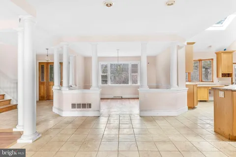 a view of a large living room with a large window