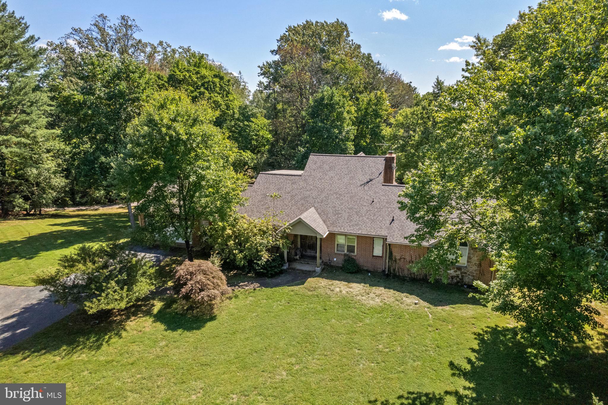 9 Walnut Ridge Road Wilmington, DE 19807 - Photo 43 of 48 a backyard of a house with lots of green space