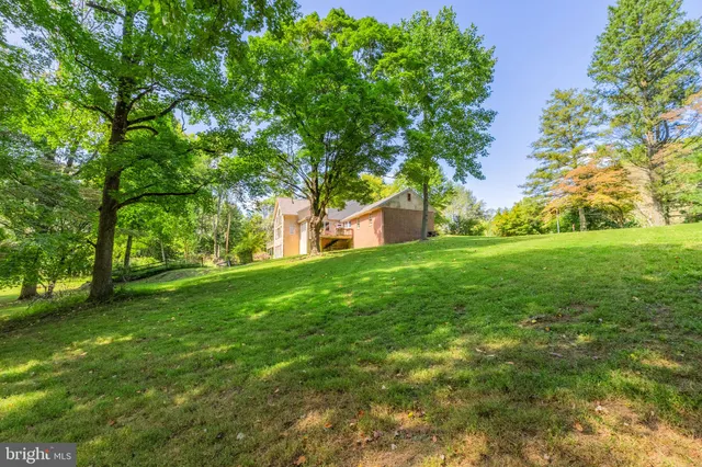 a view of a house with a big yard
