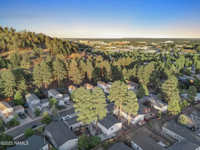 an aerial view of a city with lots of residential buildings