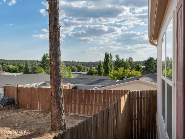 a view of a balcony with city view