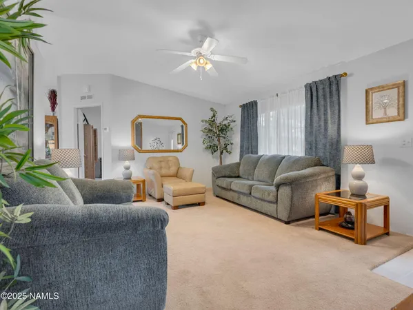 a living room with furniture and a couch