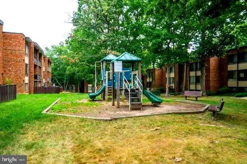 a view of a park with a slide