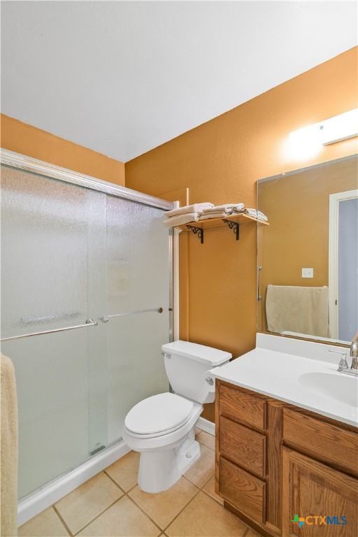 83 Lakeoak Victoria, TX 77905 - Photo 9 of 16 a bathroom with a sink a toilet and shower