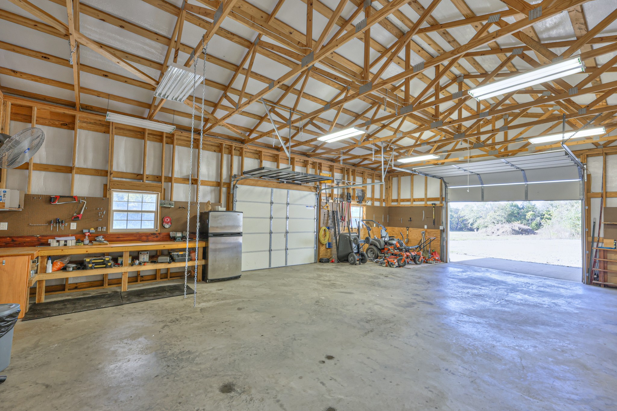 1380 Haley Road Watertown, TN 37184 - Photo 61 of 95 a view of a garage with wooden table and chairs