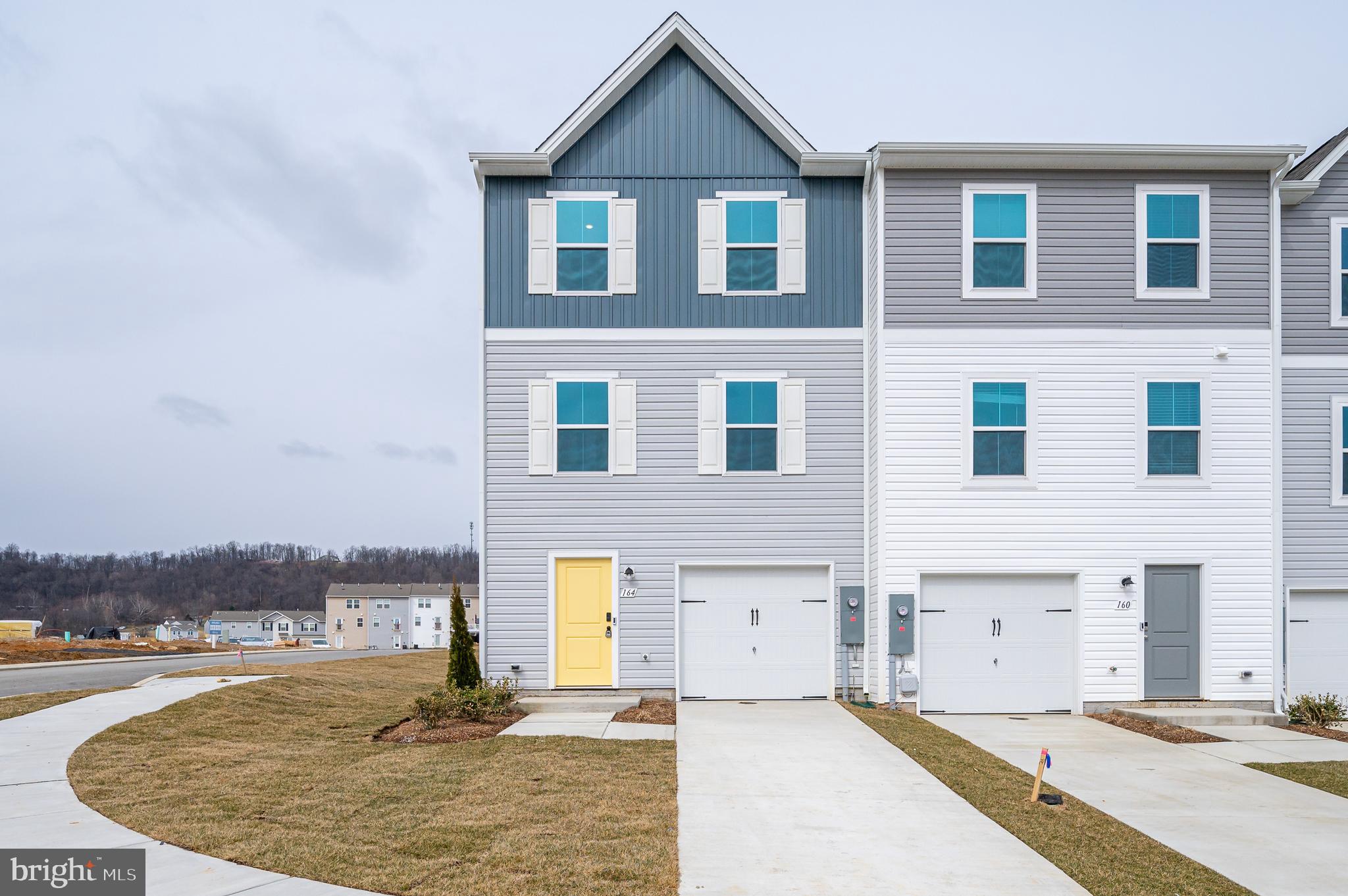 164 Rabbit Road Hedgesville, WV 25427 - Photo 1 of 41 a view of a house with a yard