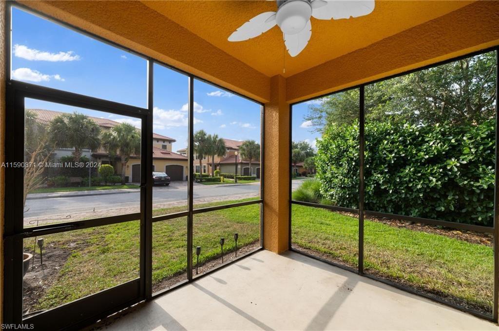 1276 Strada Milan Lane, Unit 2 Naples, FL 34105 - Photo 28 of 36 a view of a porch with a garden