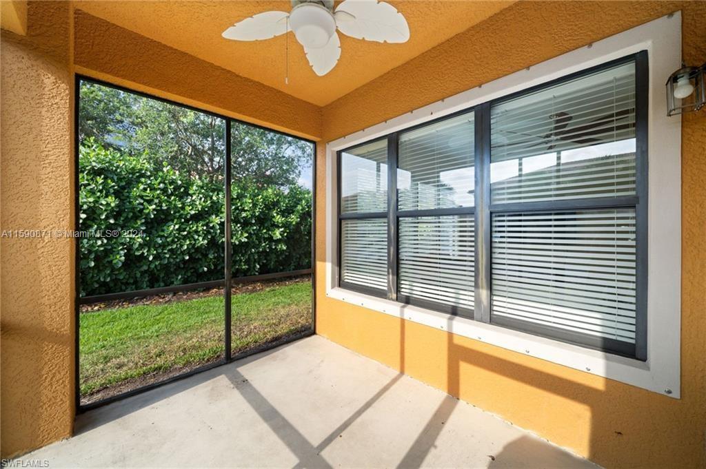 1276 Strada Milan Lane, Unit 2 Naples, FL 34105 - Photo 29 of 36 a view of a porch with a backyard