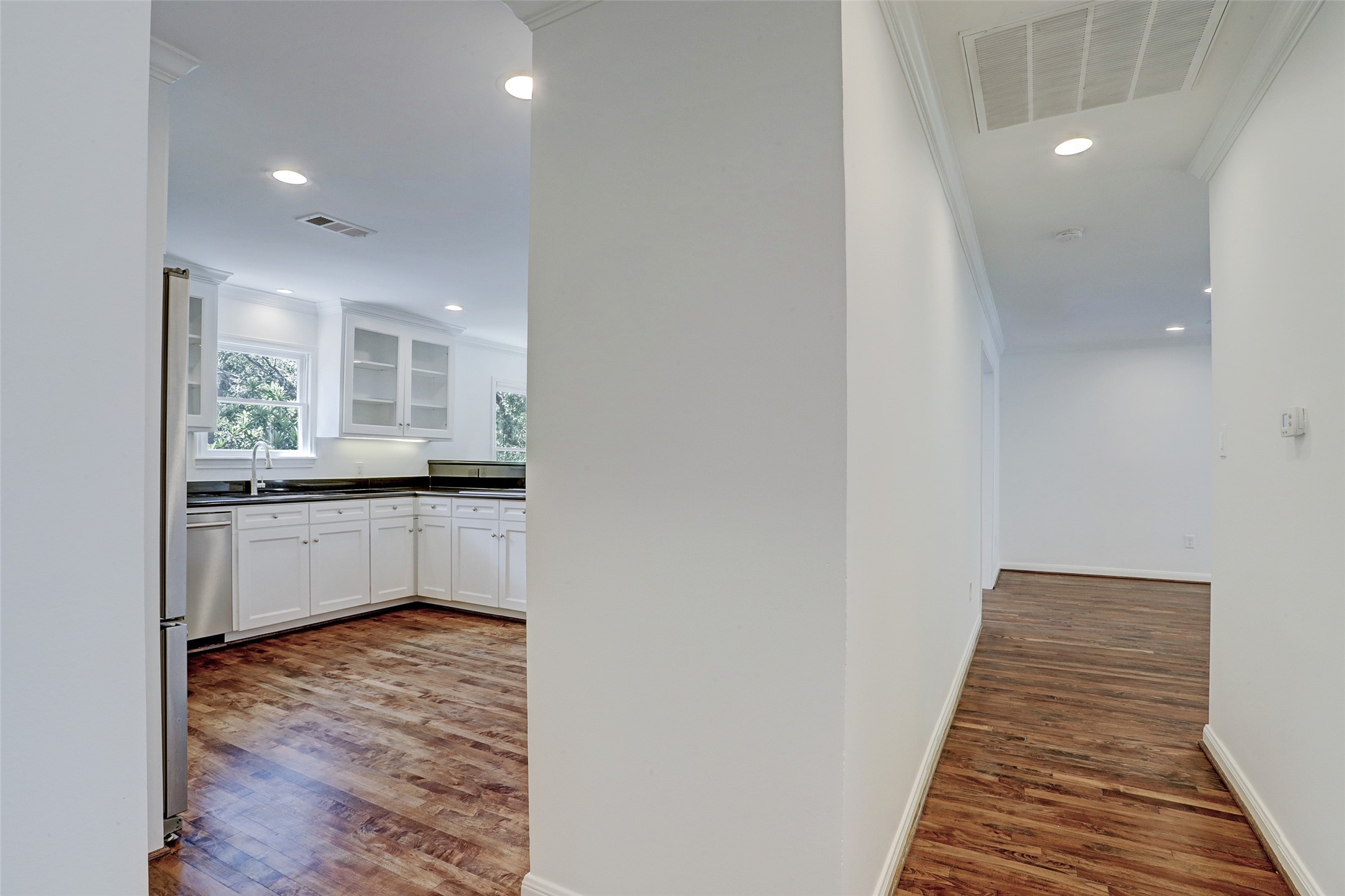 2011 South Boulevard Houston, TX 77098 - Photo 11 of 24 a bathroom with a sink and a mirror