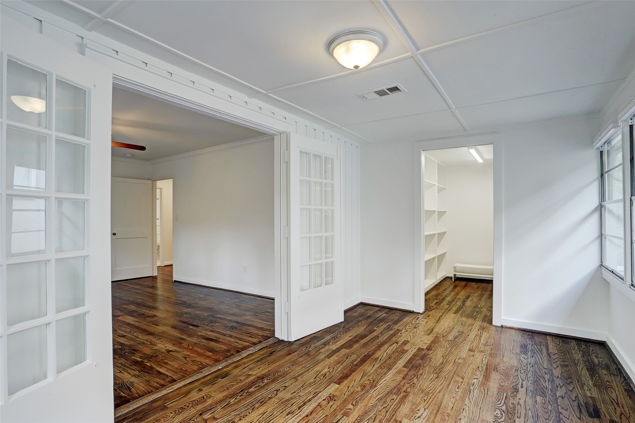 2011 South Boulevard Houston, TX 77098 - Photo 16 of 24 a view of empty room with wooden floor