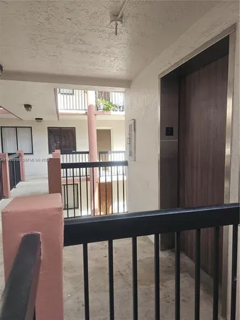 a view of a living room and a window