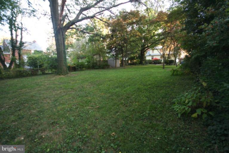 5 Stockton Road Silver Spring, MD 20901 - Photo 22 of 25 a view of green field with trees in the background