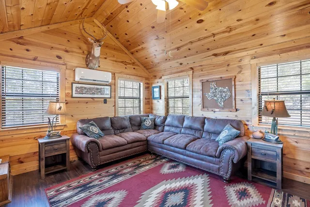 a bathroom with a granite countertop toilet a sink and a bathtub