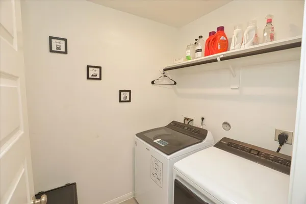 a bathroom with a sink a mirror and a shower