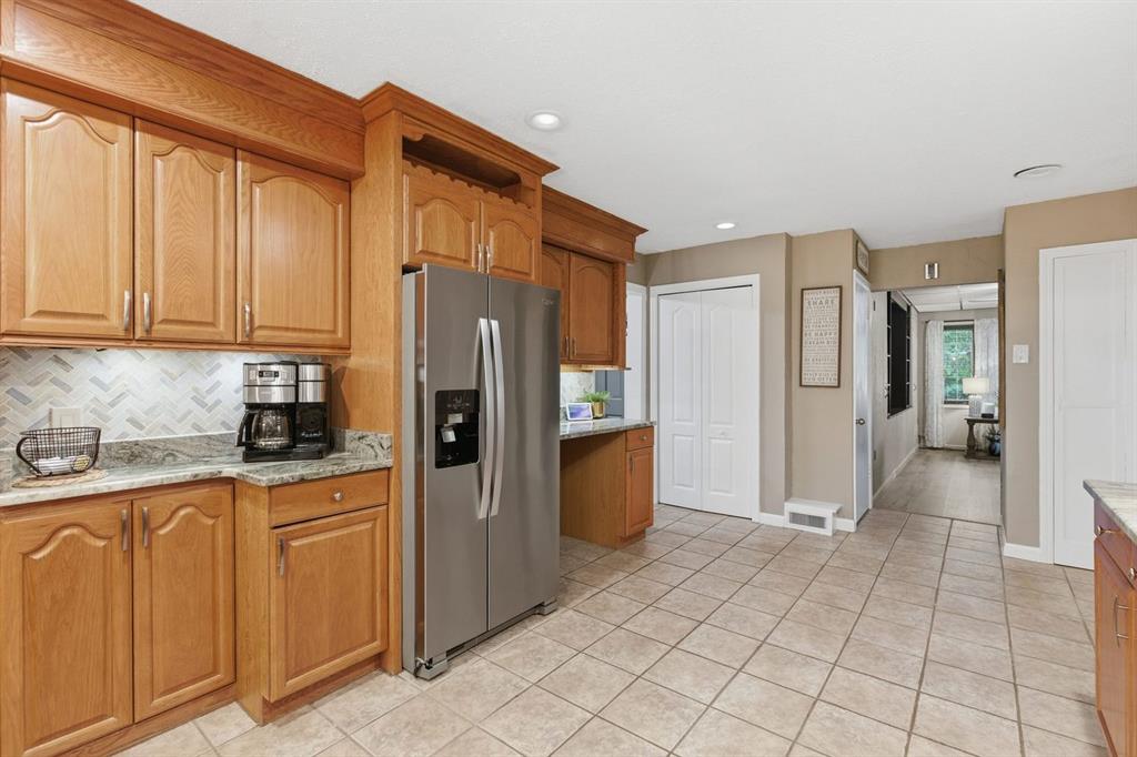 5275 Tuscarawas Road Beaver, PA 15009 - Photo 11 of 47 a kitchen with stainless steel appliances granite countertop a refrigerator and a stove