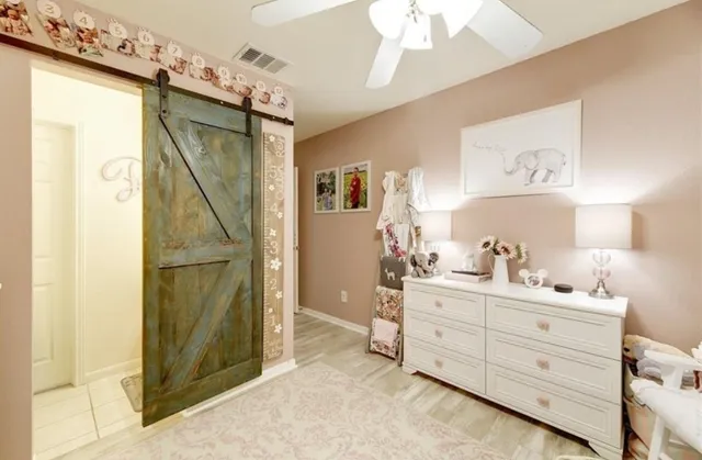 a bathroom with a double vanity sink mirror and shower