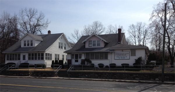 517 Boston Road Springfield, MA 01119 - Photo 1 of 1 a front view of a house with a yard