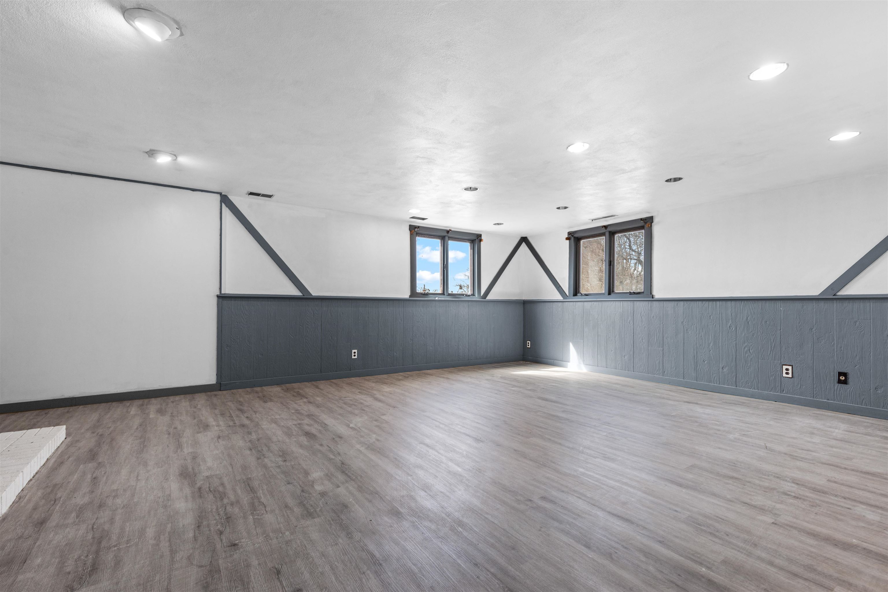 7010 Prairie Hill Road South Beloit, IL 61080 - Photo 14 of 21 an empty room with wooden floor and windows