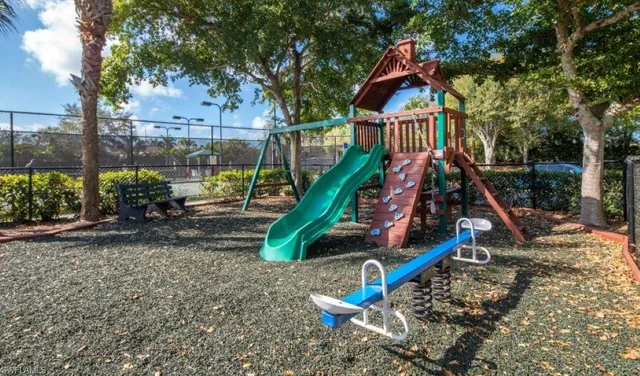 a view of a park with a slide