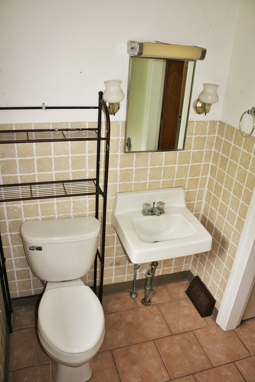 362 Mirick Road Princeton, MA 01541 - Photo 13 of 13 a bathroom with a toilet a sink and mirror