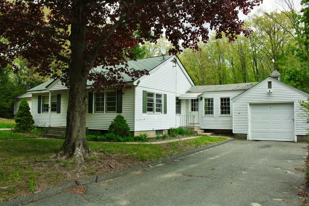 362 Mirick Road Princeton, MA 01541 - Photo 3 of 13 a front view of a house with a garden