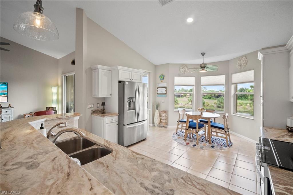 20051 Seagrove Street, Unit 1207 Estero, FL 33928 - Photo 16 of 32 a living room with furniture and a large window