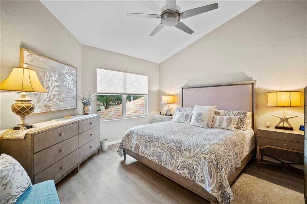 20051 Seagrove Street, Unit 1207 Estero, FL 33928 - Photo 18 of 32 a bedroom with a bed and a window