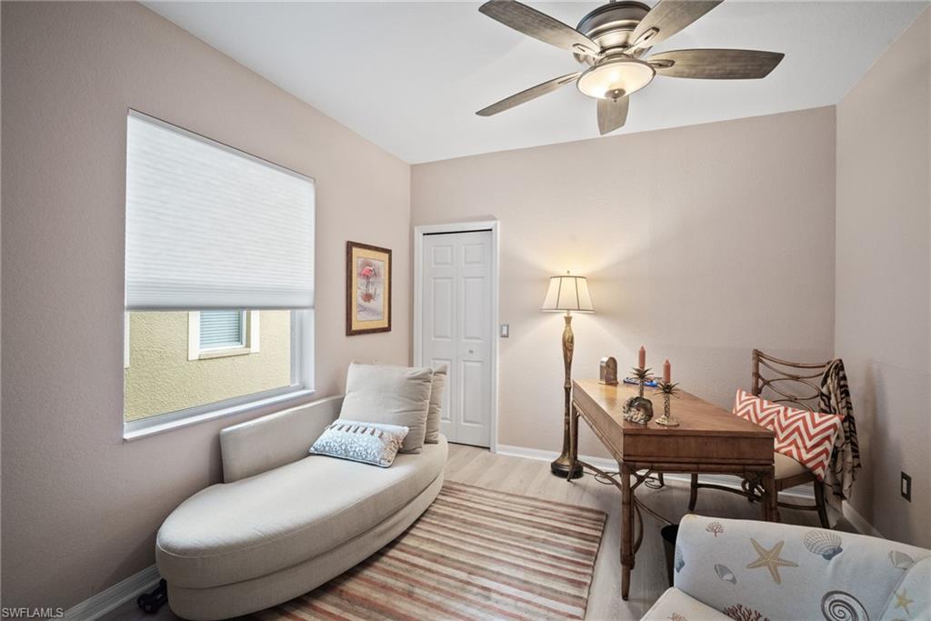 20051 Seagrove Street, Unit 1207 Estero, FL 33928 - Photo 21 of 32 a living room with furniture and a window