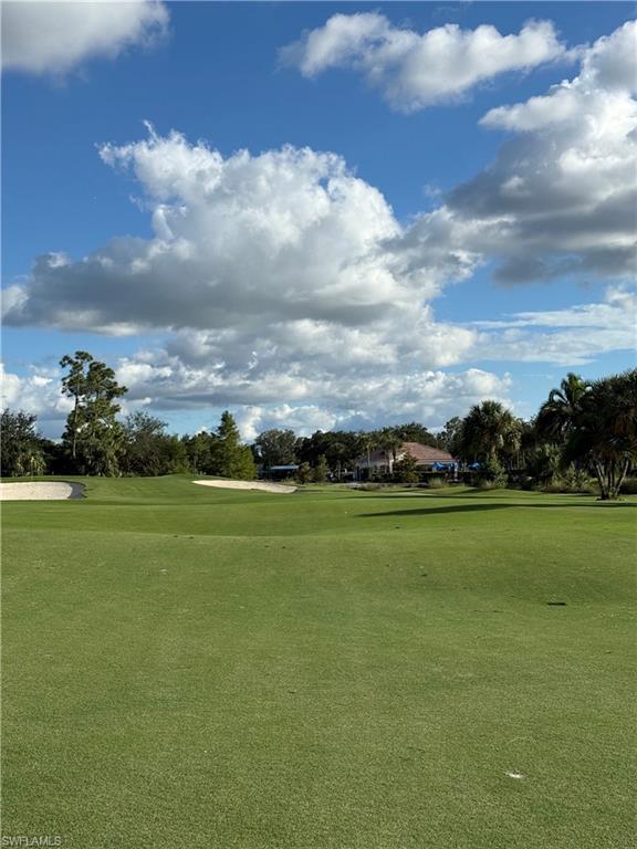 20051 Seagrove Street, Unit 1207 Estero, FL 33928 - Photo 30 of 32 a view of an ocean and beach