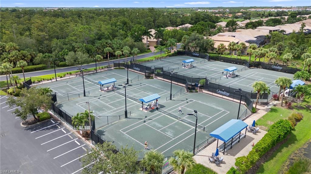 20051 Seagrove Street, Unit 1207 Estero, FL 33928 - Photo 6 of 32 an aerial view of a house with a swimming pool