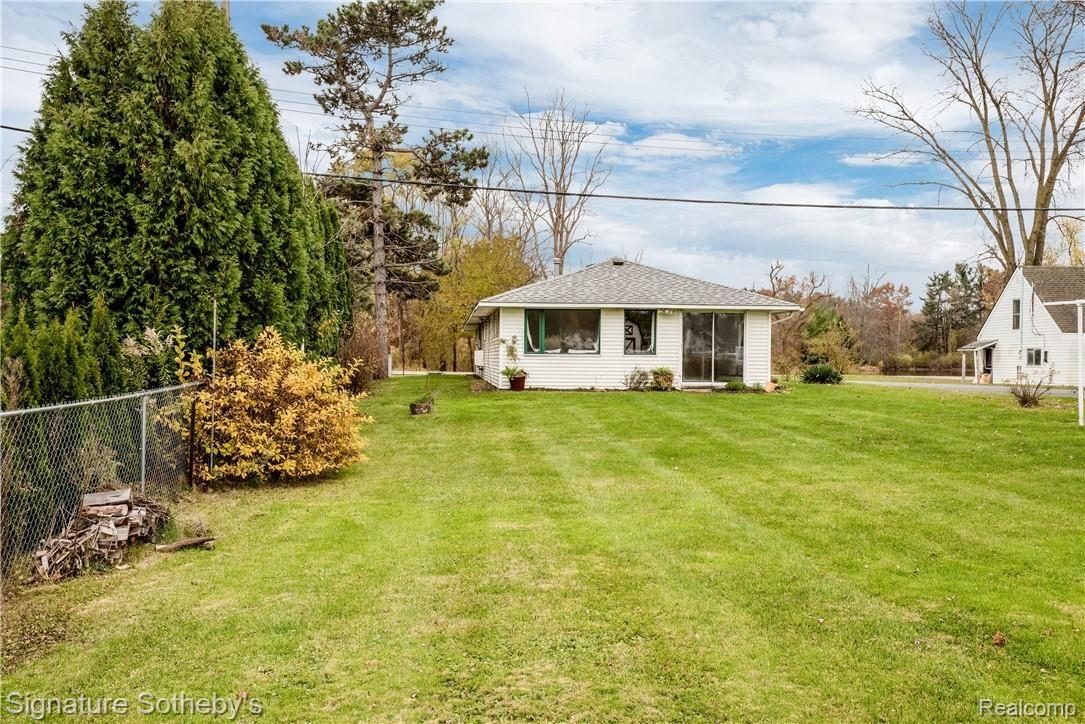 9175 Hilton Road Brighton, MI 48114 - Photo 1 of 24 60x240 Foot Lot on All Sports Woodland Lake