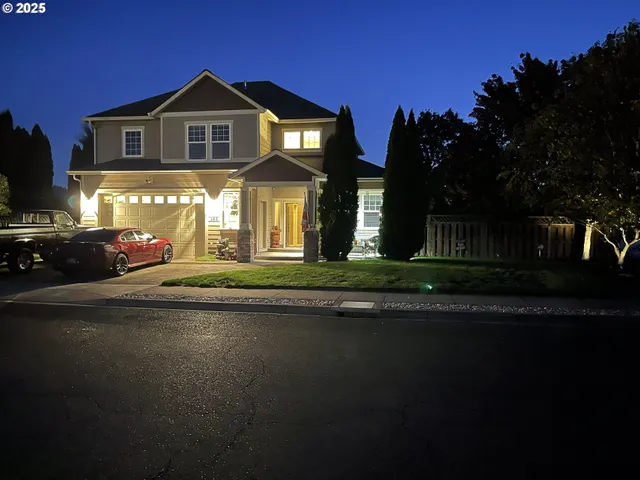a front view of a house with a yard
