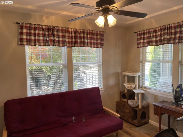 a living room with furniture and a rug