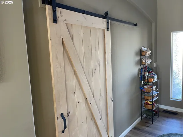 a view of a chairs and tables in the backyard