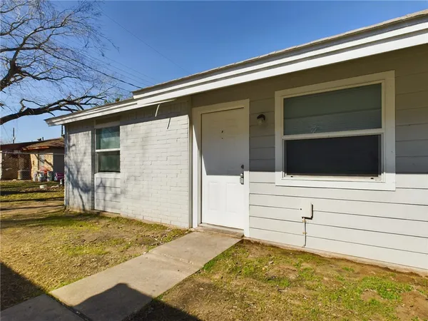 a view of house with garage