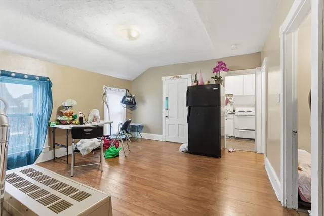 a room with furniture and a window