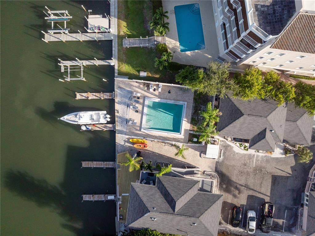 9022 Midnight Pass Road, Unit 112 Sarasota, FL 34242 - Photo 29 of 40 an aerial view of a building with outdoor space