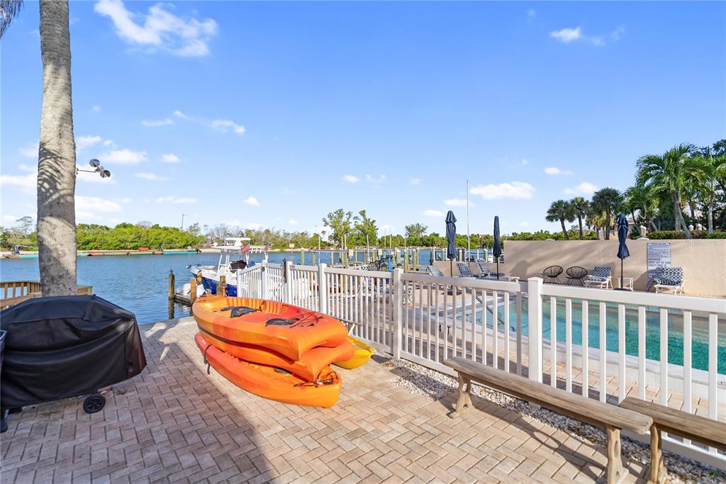 9022 Midnight Pass Road, Unit 112 Sarasota, FL 34242 - Photo 34 of 40 a view of a ocean from a balcony