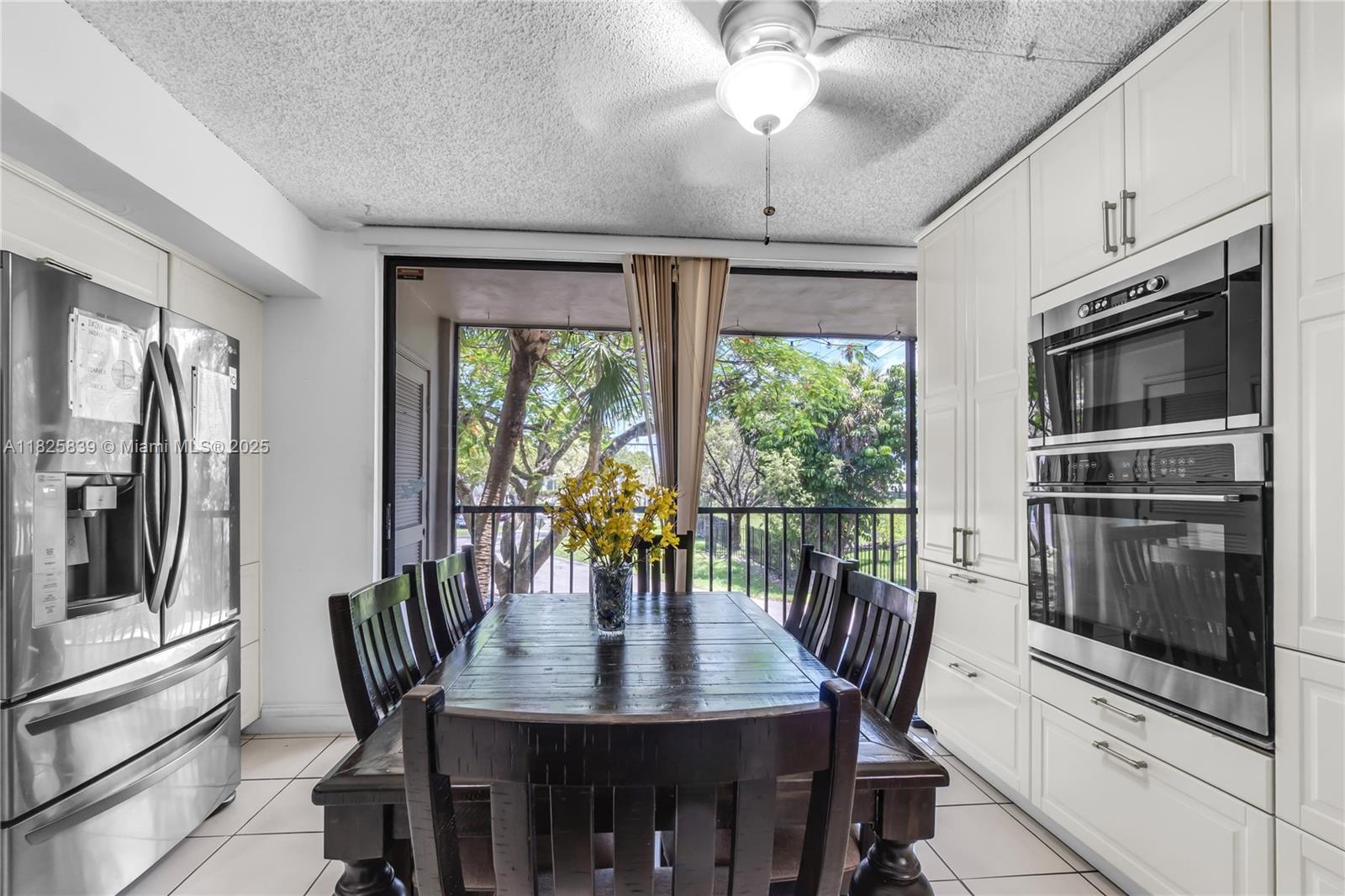8400 Southwest 133rd Avenue Road, Unit 212 Miami, FL 33183 - Photo 11 of 32 a view of a dining room with furniture window and outside view