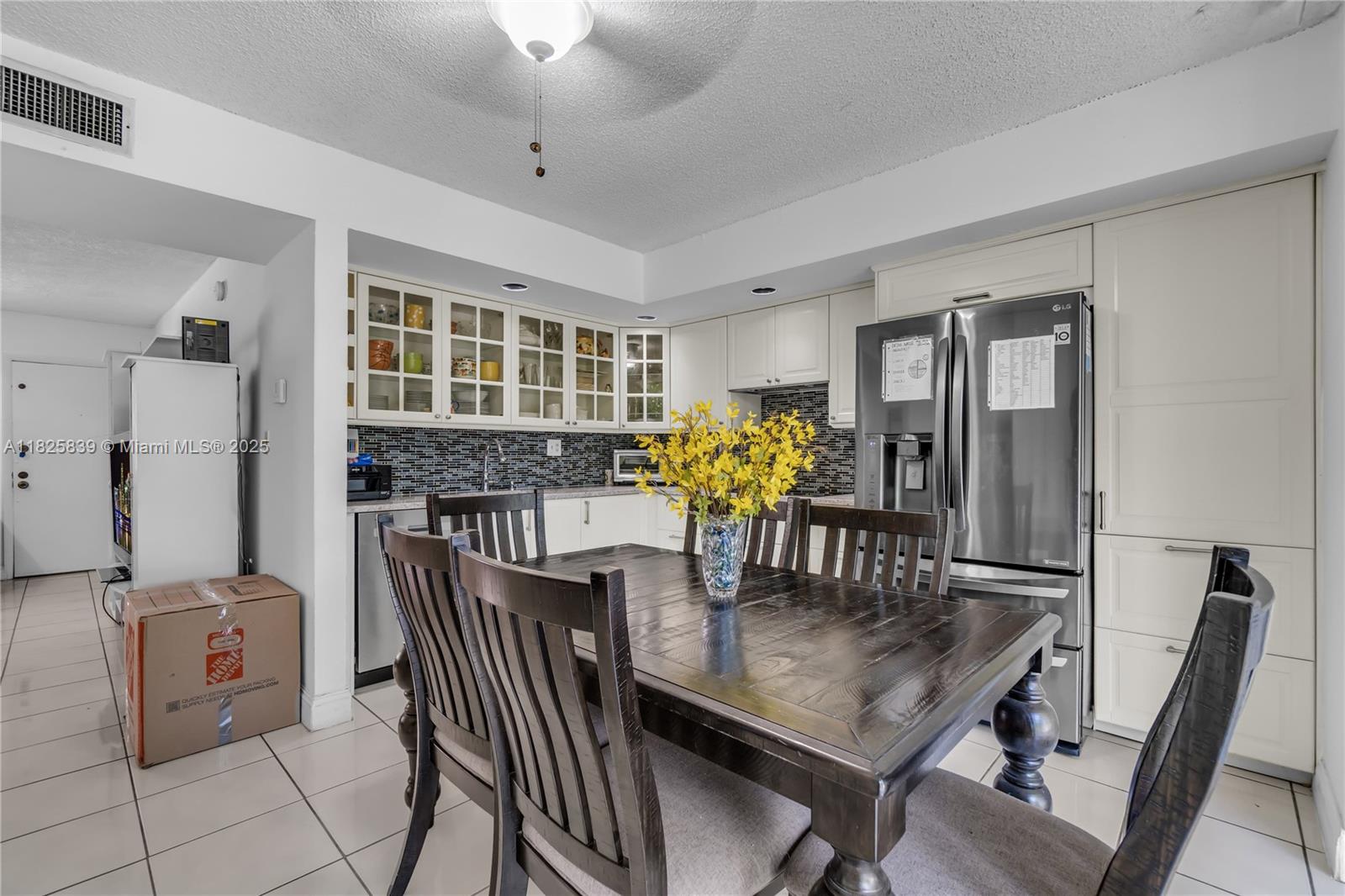 8400 Southwest 133rd Avenue Road, Unit 212 Miami, FL 33183 - Photo 18 of 32 a dining room with furniture and window