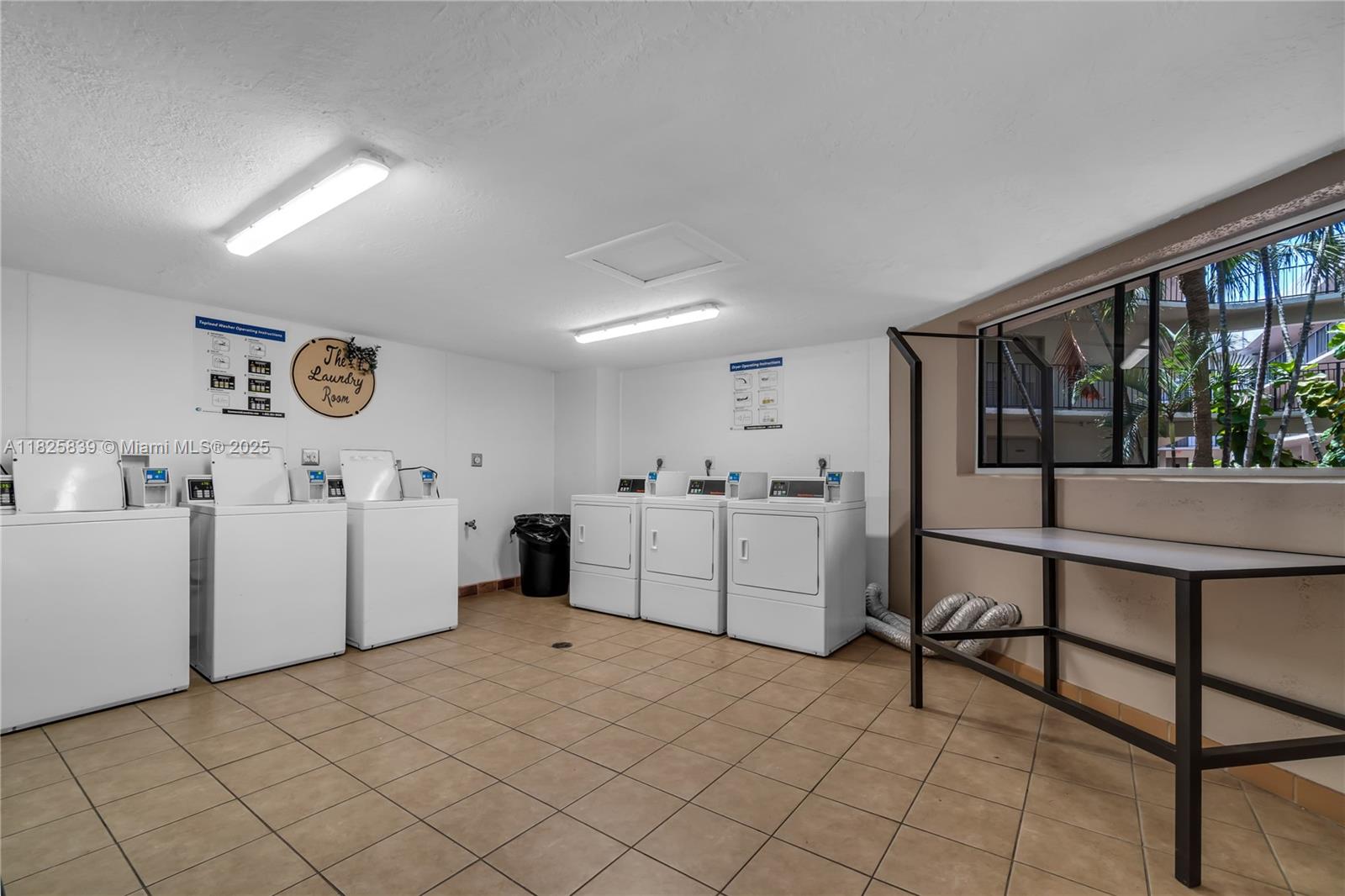 8400 Southwest 133rd Avenue Road, Unit 212 Miami, FL 33183 - Photo 23 of 32 a view of kitchen with furniture and window