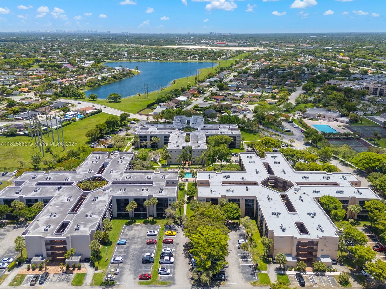 8400 Southwest 133rd Avenue Road, Unit 212 Miami, FL 33183 - Photo 25 of 32 an aerial view of residential houses with outdoor space