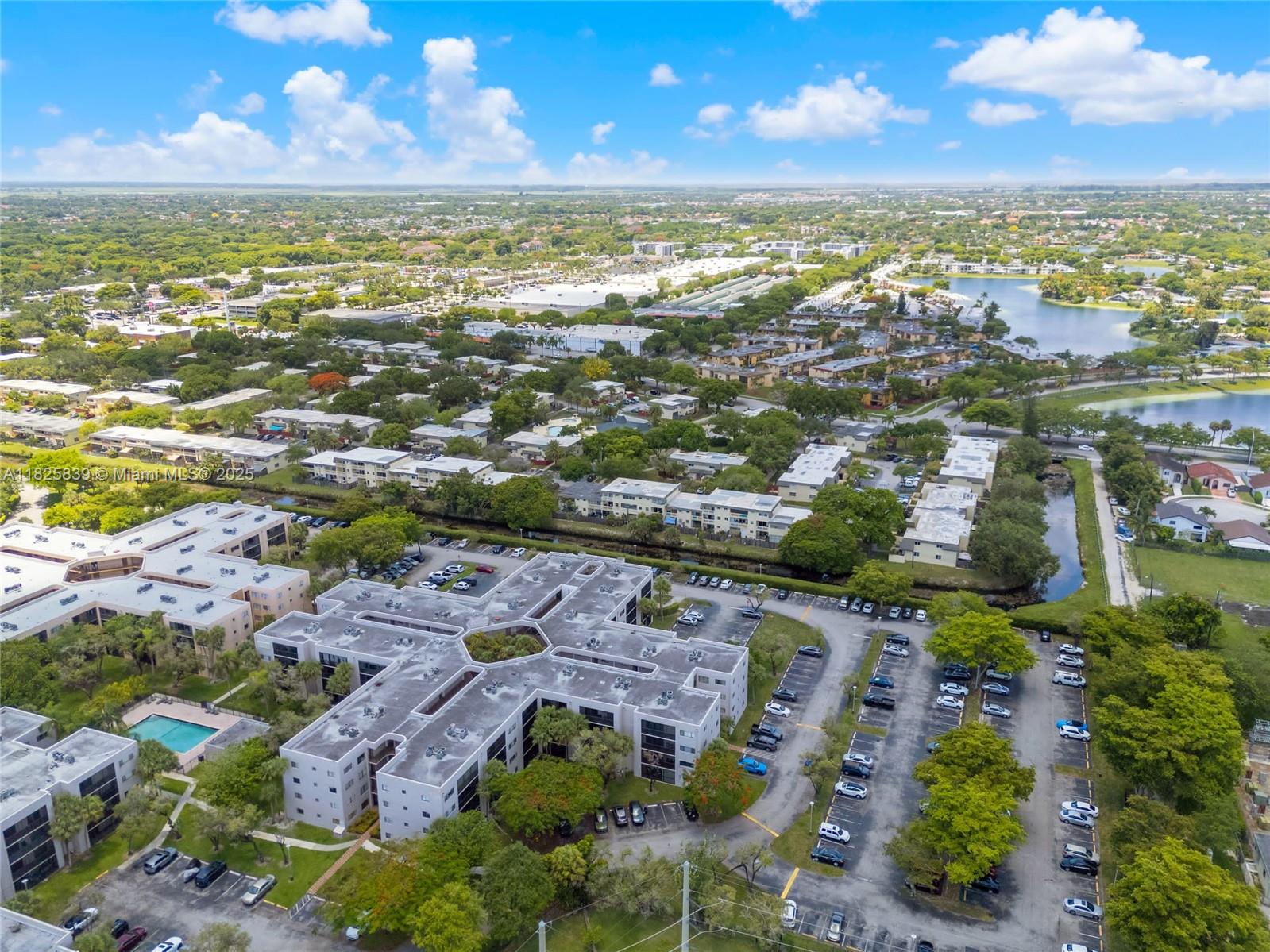 8400 Southwest 133rd Avenue Road, Unit 212 Miami, FL 33183 - Photo 28 of 32 a view of a city with an ocean