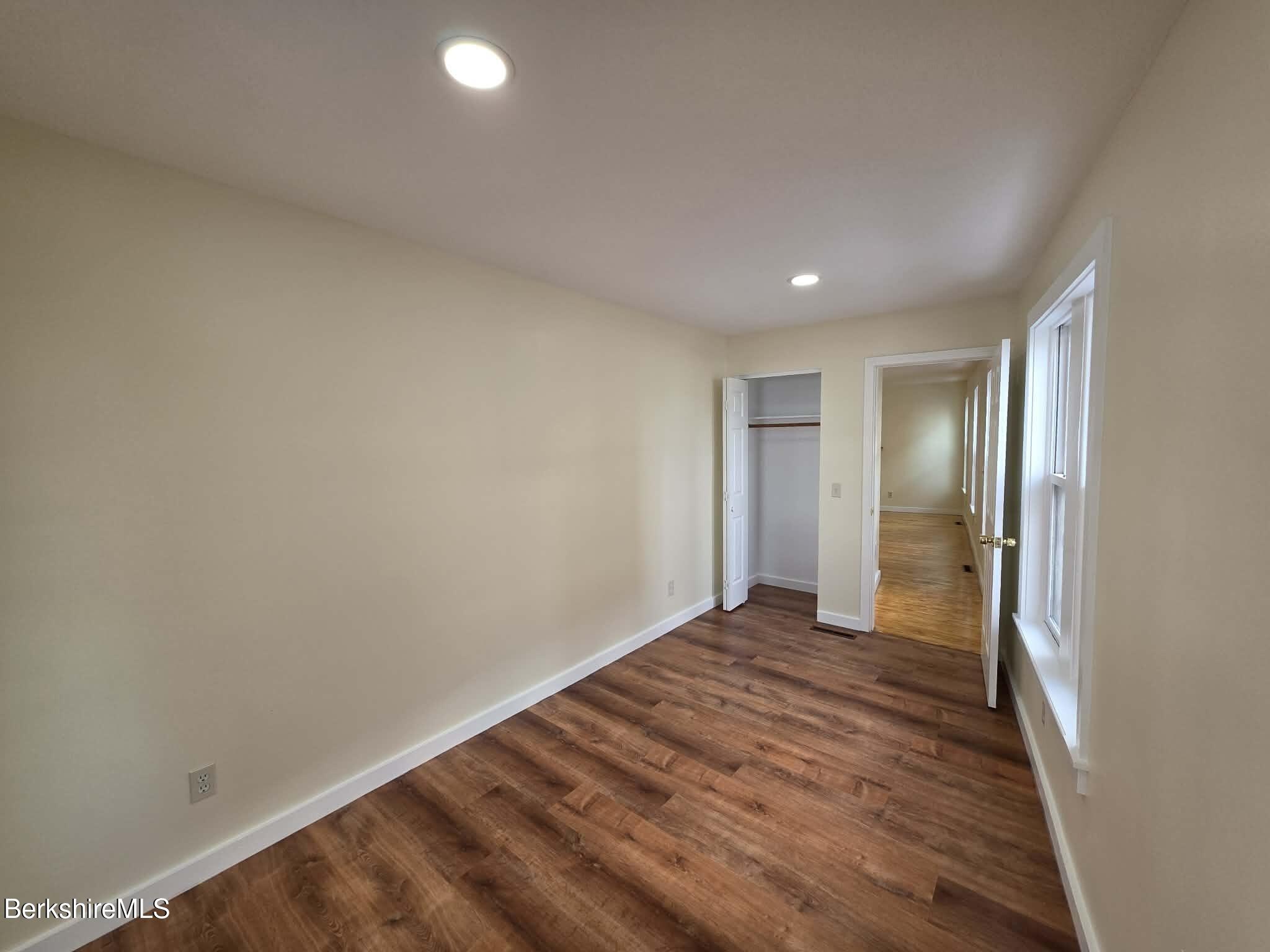 19 Pleasant Street, Unit 2B Adams, MA 01220 - Photo 12 of 14 a view of an empty room and window