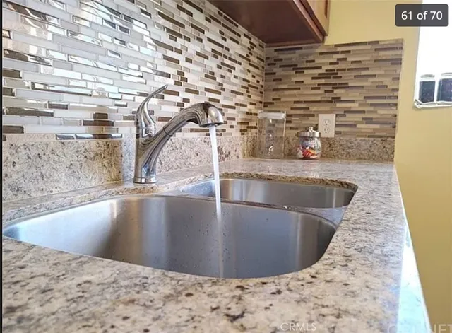 a view of a kitchen with sink