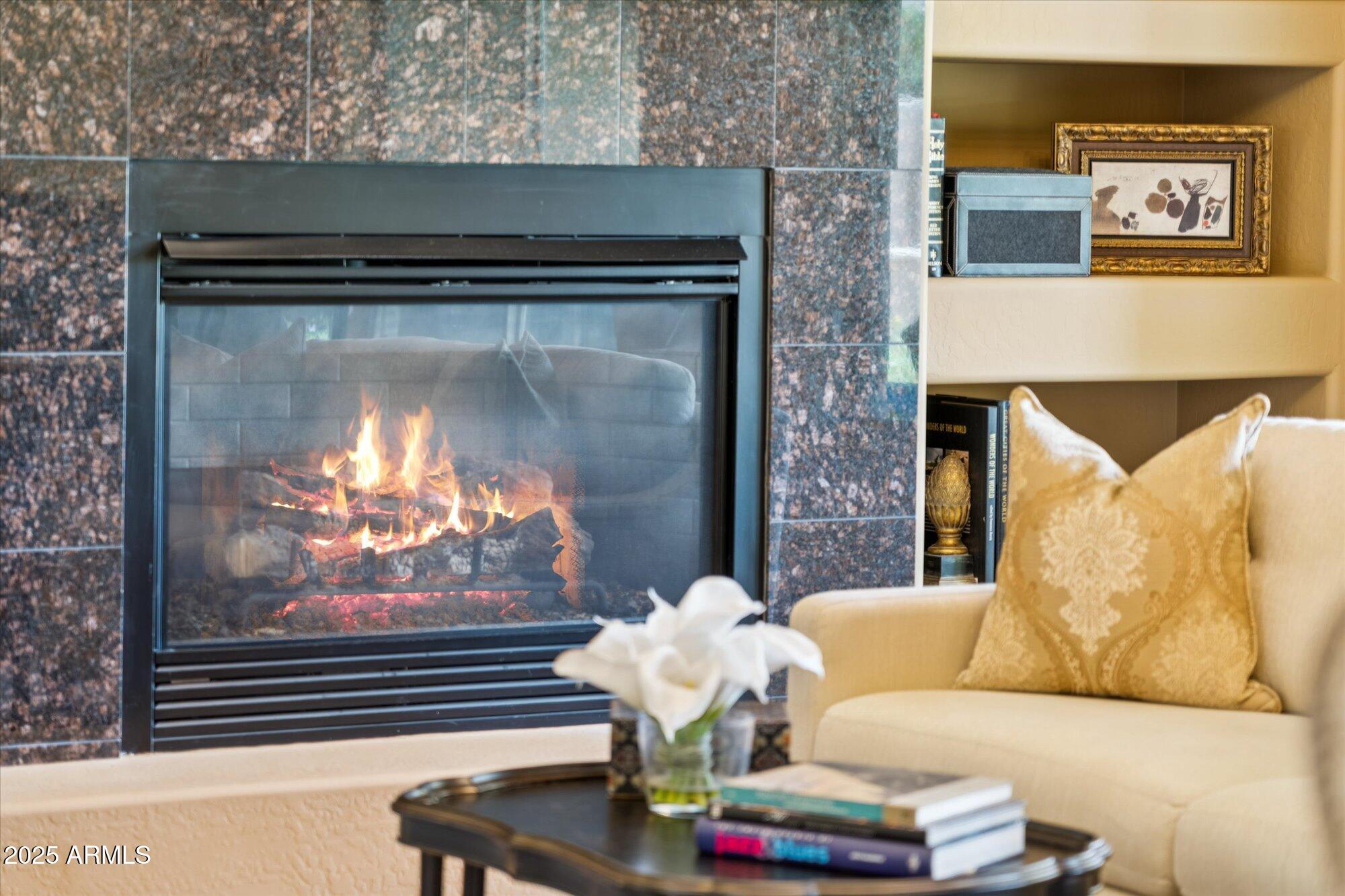 4959 North Village Road Litchfield Park, AZ 85340 - Photo 13 of 55 a living room with furniture and a fireplace