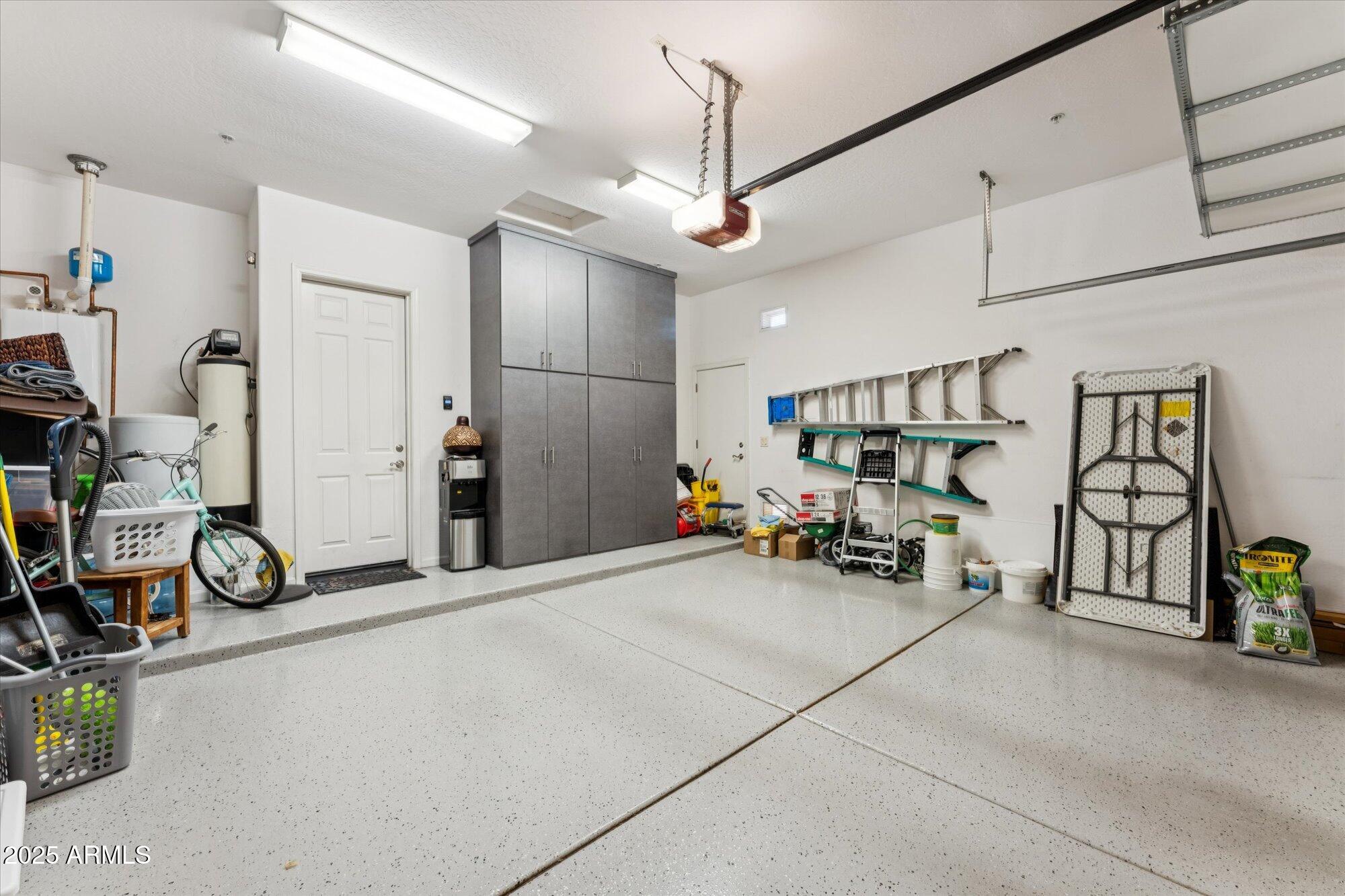 4959 North Village Road Litchfield Park, AZ 85340 - Photo 49 of 55 a view of a garage with rack and bicycle