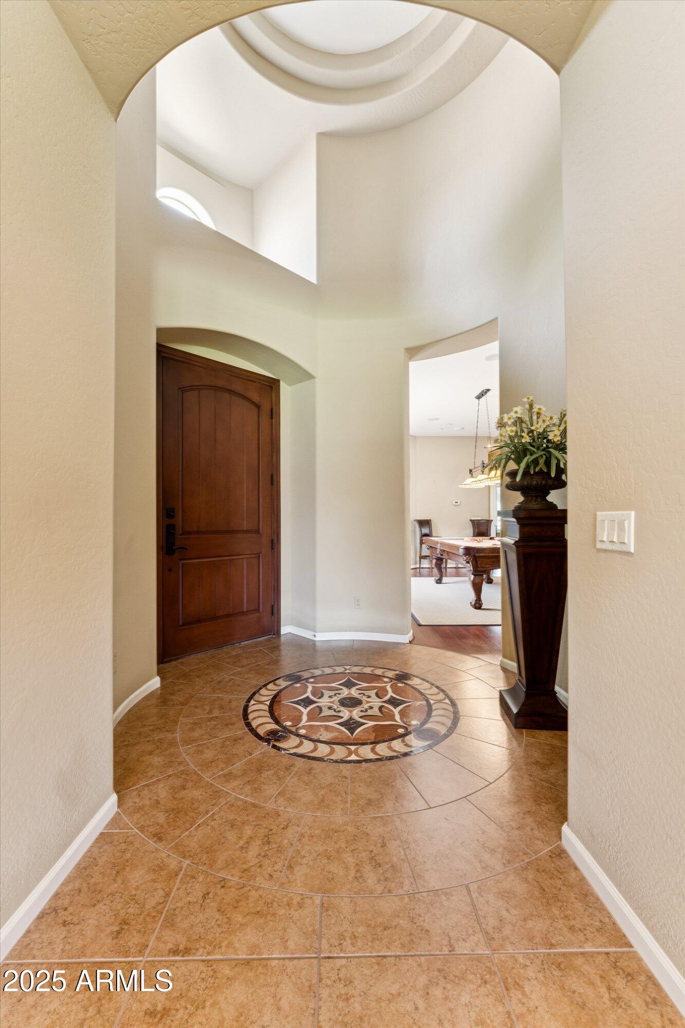 4959 North Village Road Litchfield Park, AZ 85340 - Photo 5 of 55 a view of a livingroom with furniture and front door