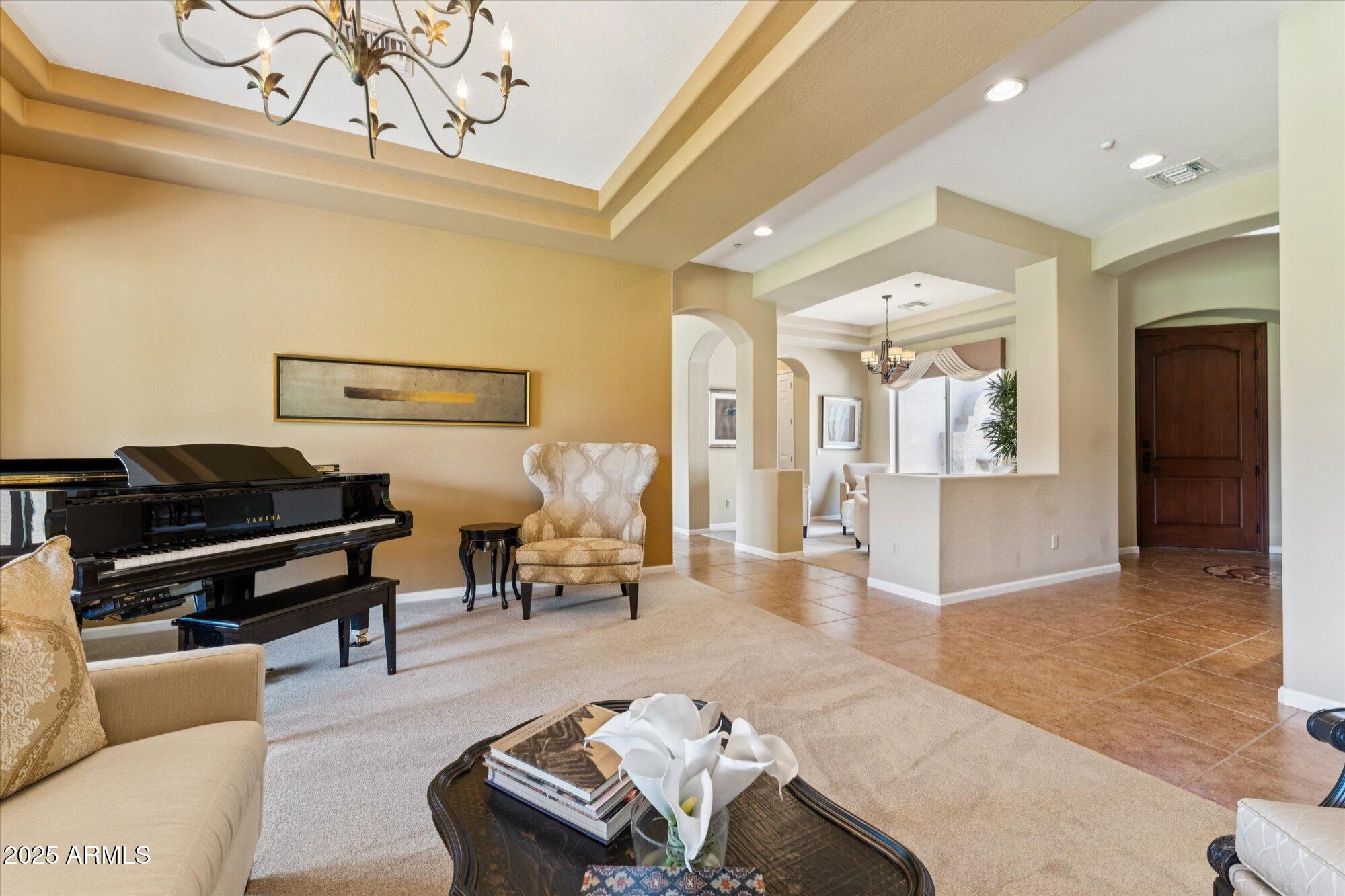 4959 North Village Road Litchfield Park, AZ 85340 - Photo 7 of 55 a living room with furniture and wooden floor